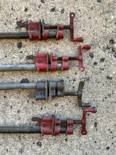 Four (4) Adjustable Woodworking Pipe Clamps Tools