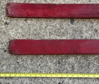 Red Wooden Skis with Suwe Cortina Bindings,