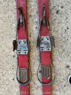 Red Wooden Skis with Suwe Cortina Bindings,