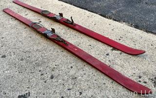 Red Wooden Skis with Suwe Cortina Bindings,