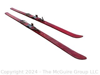 Red Wooden Skis with Suwe Cortina Bindings,