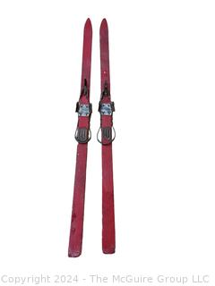 Red Wooden Skis with Suwe Cortina Bindings,