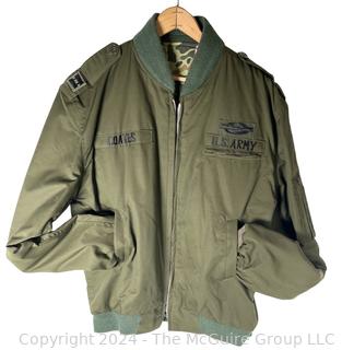 US Army Light Zippered Jacket, camo lined, Captain and CIB subdued insignia.