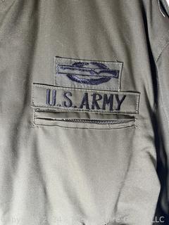 US Army Light Zippered Jacket, camo lined, Captain and CIB subdued insignia.