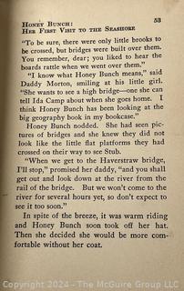 Two (2) Children's Books:  Honey Bunch: Her First Visit to The Seashore by Helen Louise Thorndyke and The Outdoor Girls of Deepdale by Laura Lee Hope