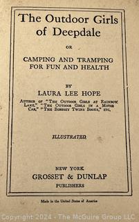 Two (2) Children's Books:  Honey Bunch: Her First Visit to The Seashore by Helen Louise Thorndyke and The Outdoor Girls of Deepdale by Laura Lee Hope