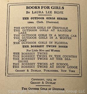 Two (2) Children's Books:  Honey Bunch: Her First Visit to The Seashore by Helen Louise Thorndyke and The Outdoor Girls of Deepdale by Laura Lee Hope