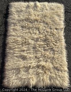 Mid Century White Wool Shag Flokati Rug by Karamichos & Co. Greece. Ties on Side to Attach to Matching Rug. 50" x 72". First of Two Offered in This Auction