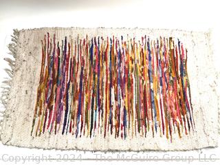 Rag Throw Rug on White Ground. 24 x 38"