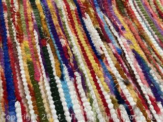 Rag Throw Rug on White Ground. 24 x 38"