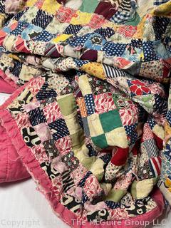 Hand Made Cotton Patchwork Quilt with Pink Binding. Note Damage. 76" x 64" 