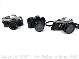 Three SLR 35mm Film Cameras: Konica, Pentax and Canon (untested) Was 17LH