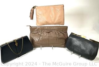 Four (4) Leather Clutch Style Hand Bags.