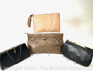 Four (4) Leather Clutch Style Hand Bags.