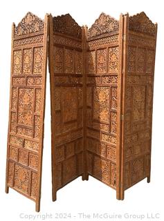 Moroccan Carved Pierced Wood Four (4) Panel Floor Screen.  Needs repair to hinges.  67" tall 80" long (20"W each panel)