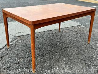 ??????????????? Mid Century Teak Expanding Dining Table.  Some wear to table top. 