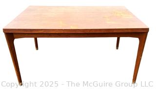 ??????????????? Mid Century Teak Expanding Dining Table.  Some wear to table top. 