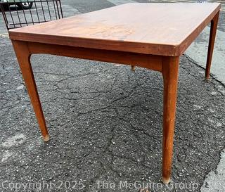 ??????????????? Mid Century Teak Expanding Dining Table.  Some wear to table top. 