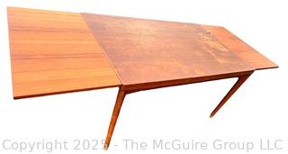 ??????????????? Mid Century Teak Expanding Dining Table.  Some wear to table top. 