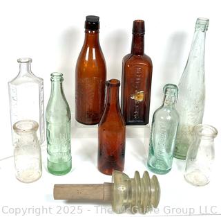 Nine (9) Glass Bottles and One (1) Glass Insulator