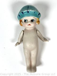 Bisque Porcelain Kewpie Doll With Flapper Hat and Jointed Arms made in Japan.  7" tall.