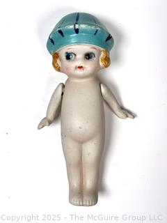 Bisque Porcelain Kewpie Doll With Flapper Hat and Jointed Arms made in Japan.  7" tall.