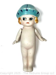 Bisque Porcelain Kewpie Doll With Flapper Hat and Jointed Arms made in Japan.  7" tall.