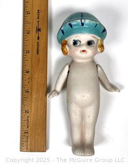 Bisque Porcelain Kewpie Doll With Flapper Hat and Jointed Arms made in Japan.  7" tall.