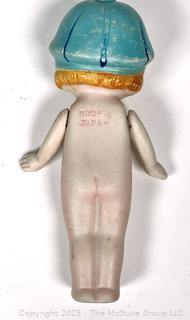 Bisque Porcelain Kewpie Doll With Flapper Hat and Jointed Arms made in Japan.  7" tall.