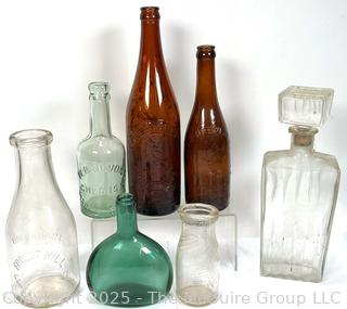 Seven (7) Antique Bottles from Privy Dig