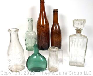 Seven (7) Antique Bottles from Privy Dig