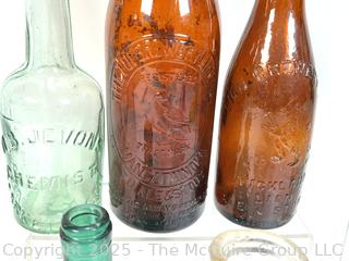 Seven (7) Antique Bottles from Privy Dig