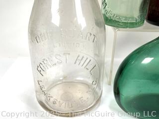 Seven (7) Antique Bottles from Privy Dig