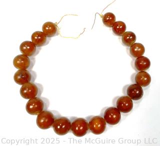 9" Strand of Carved Round Amber Beads 