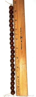 9" Strand of Carved Round Amber Beads 