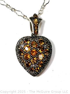 Sterling Silver Hinged Locket Encrusted in Citrine Gem Stones on 18" Chain. 