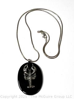 Sterling Silver Lobster Mounted on Black Onyx Pendant with Chain. 