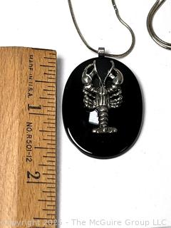 Sterling Silver Lobster Mounted on Black Onyx Pendant with Chain. 