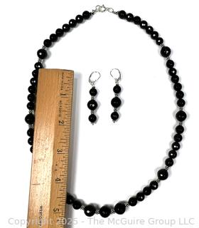 Set of Faceted Black Onyx and Sterling Silver Bead Necklace and Drop Earrings. 