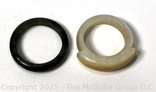 Two (2) Carved Rings in Nephite Jade and Jadeite Jade.