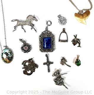 Collection of Pendants Including Sterling Silver