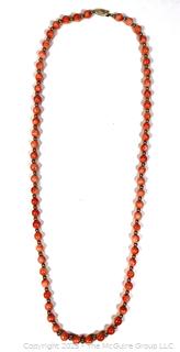 Round Pink Coral Bead Necklace with 14Kt Yellow Gold Beads and Clasp