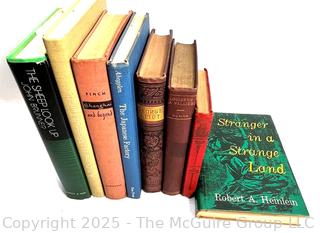 Eight (8) Books Including Stranger in a Strange Land. 