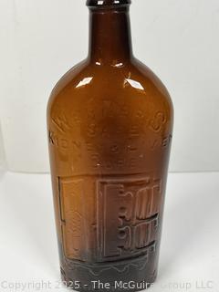 Amber Brown Warner's Safe Kidney & Liver Cure Rochester NY Embossed Bottle. 10"T