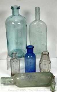 Six (6) Glass Bottles Including Torpedo Bottle
