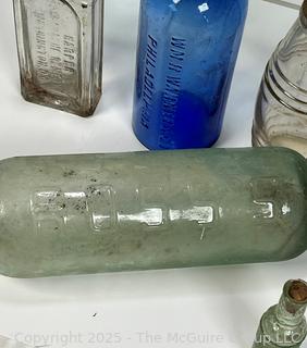 Six (6) Glass Bottles Including Torpedo Bottle
