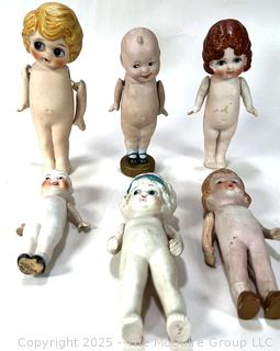 Six (6) Porcelain Dolls with Articulated Arms