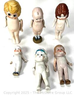 Six (6) Porcelain Dolls with Articulated Arms