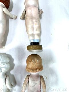 Six (6) Porcelain Dolls with Articulated Arms