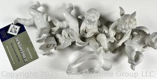 Six (6) Fitz & Floyd Porcelain Cupid Figurines